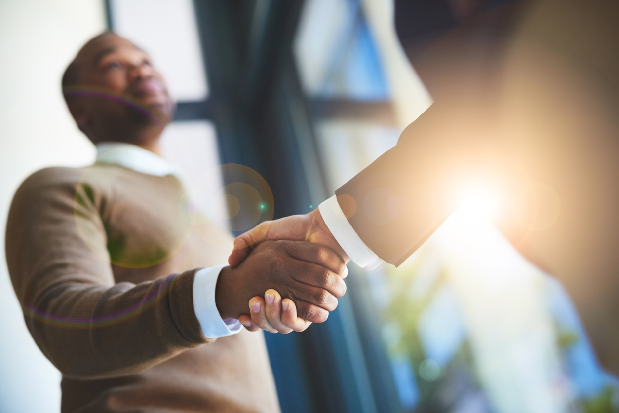 two people shaking hands