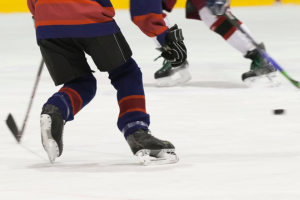 Close-up photo of a hockey game.