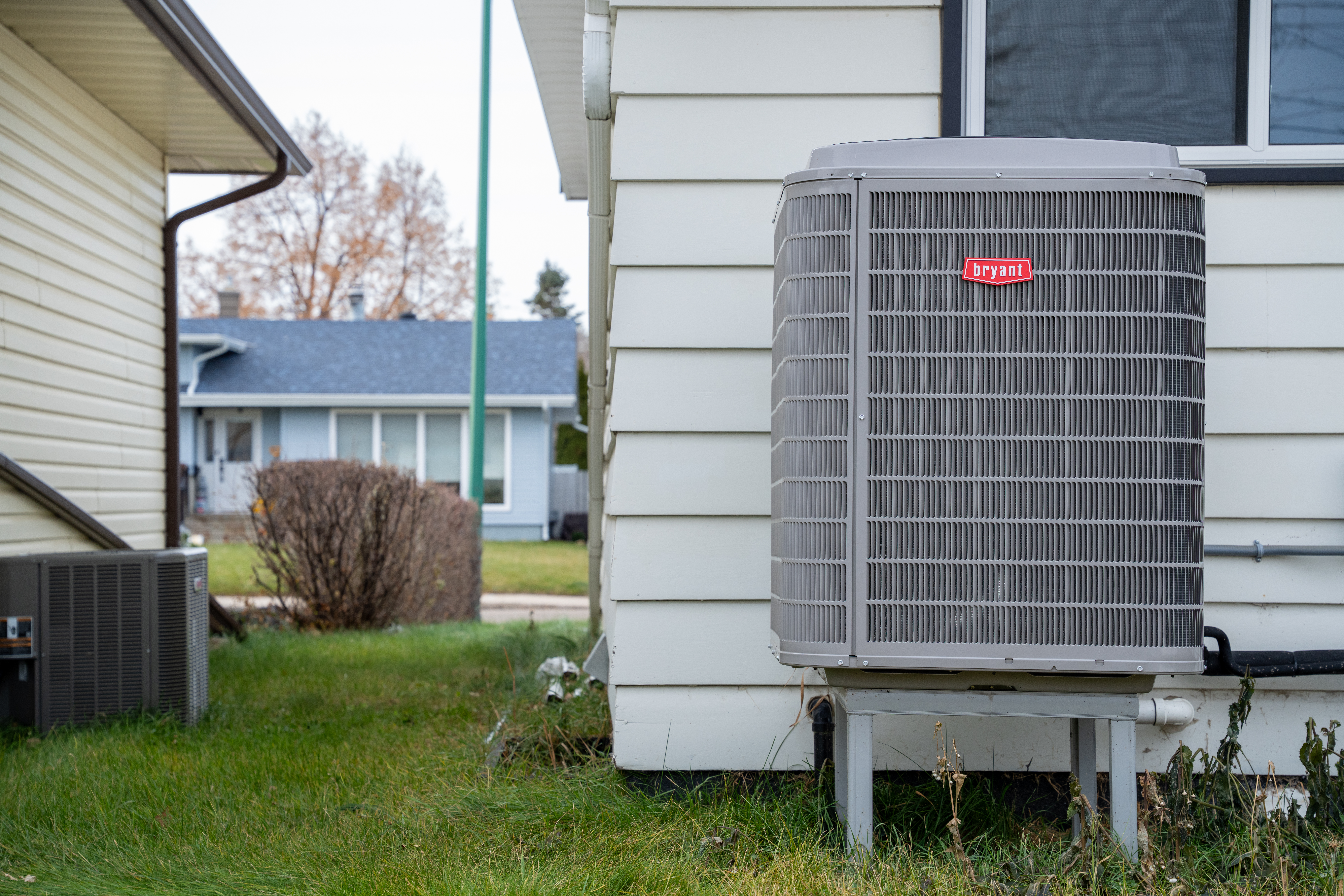 New heat pump outside a small residential home. 