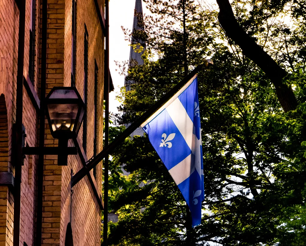 Quebec flag on the side of a building