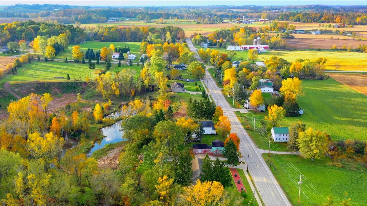 aerial view of small town in rural setting in autumn.