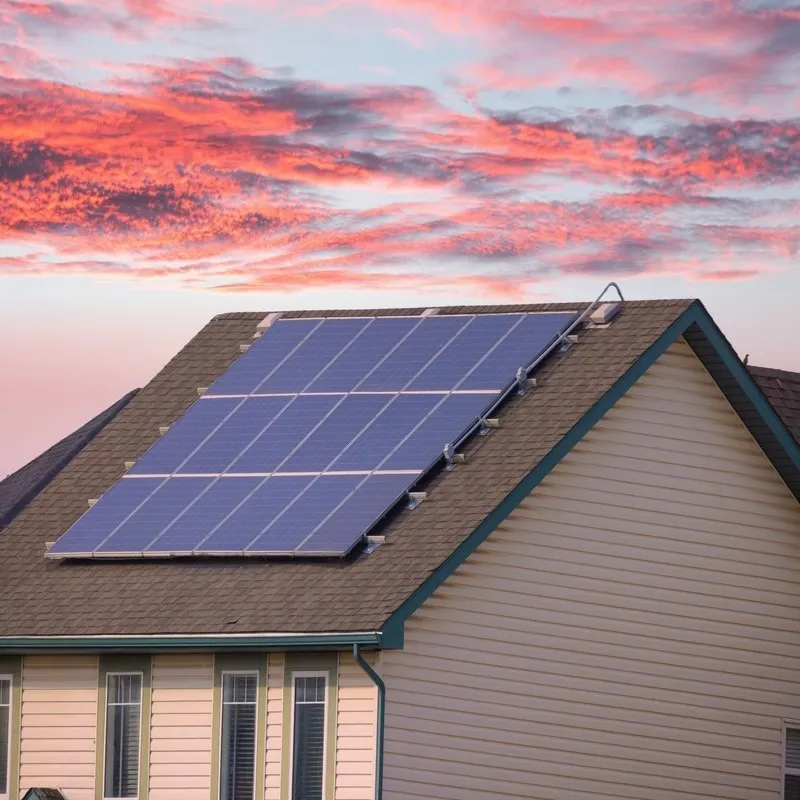 A House with a Solar Panel system during afternoon