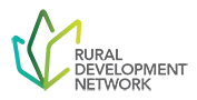 The logo for the Rural Development Network, featuring three diamond shapes in different shades of green, fanned out next to the name in grey text