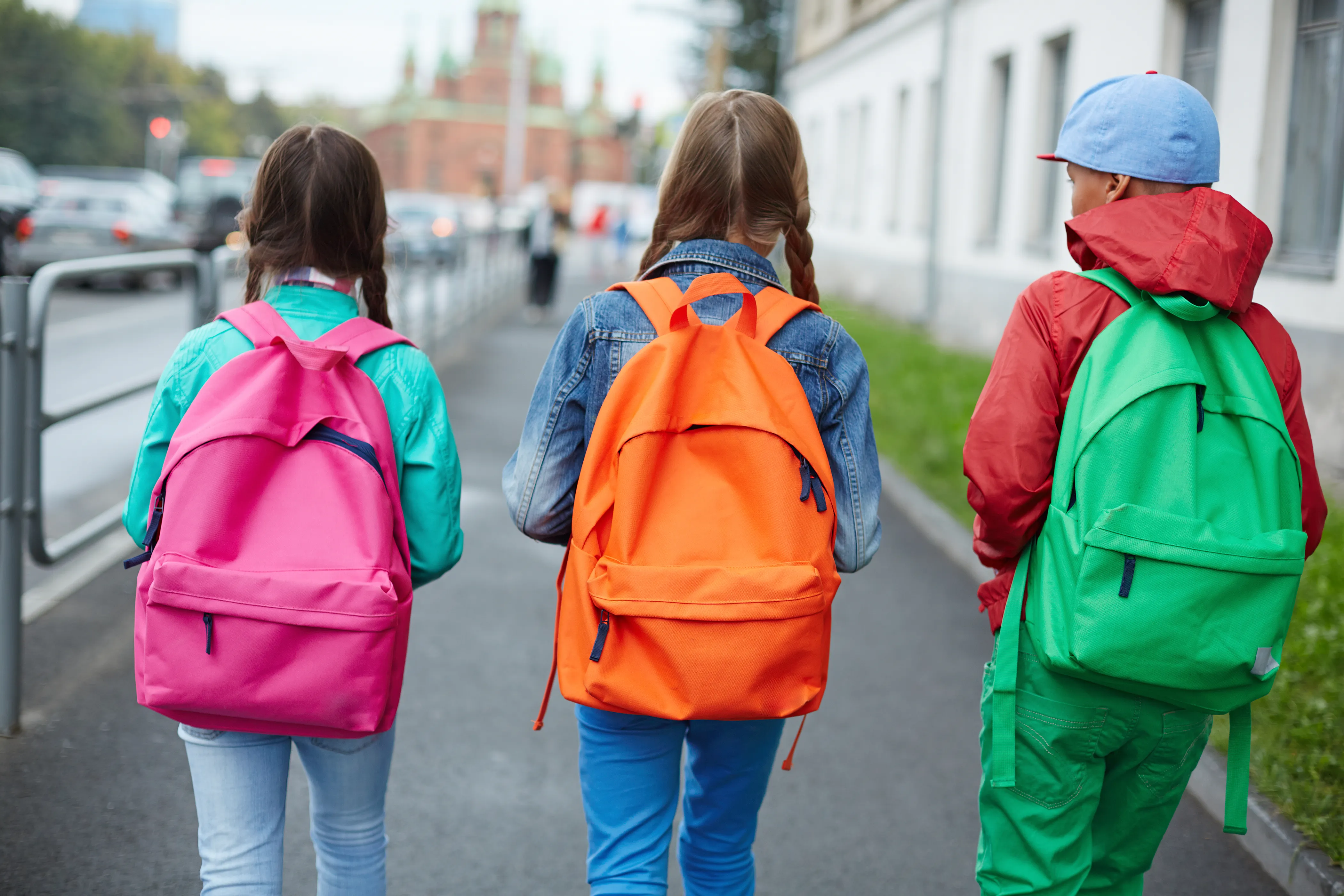 Three kids going to school